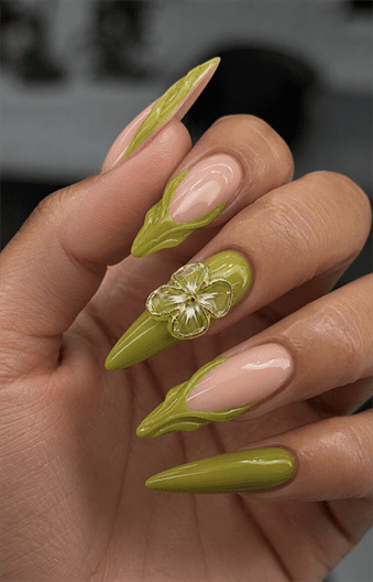 Olive green botanical stiletto nails with 3D floral accents, sculpted leaf French tips and glossy nude base