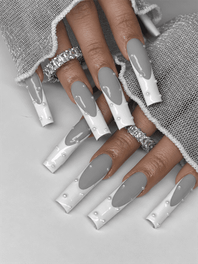 Gray and white drip coffin nails with raised pearl accents and a glossy finish