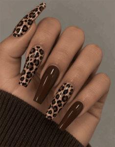Brown leopard print coffin nails with glossy chocolate brown accent nails and classic animal print
