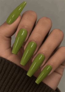Matcha green coffin nails with a solid olive green color and high-shine glossy finish