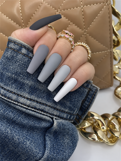 Matte gray ombré coffin nails fading from dark charcoal to white with a minimalist gradient design