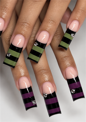 Extra-long square Halloween nails with black, olive green and purple stripes, nude bases, and rhinestones.