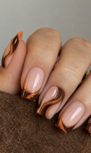 Medium-long square nails with glossy nude bases, chocolate brown swirls, burnt orange waves and French tips.
